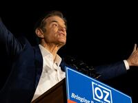 Mehmet Oz speaks at a political rally.