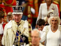 King Charles III wears the Imperial State Crown and Queen Camilla wears the Diamond Diadem during a ceremony on the day of the State Opening of Parliament at the Palace of Westminster, on July 17, 2024 in London, England.