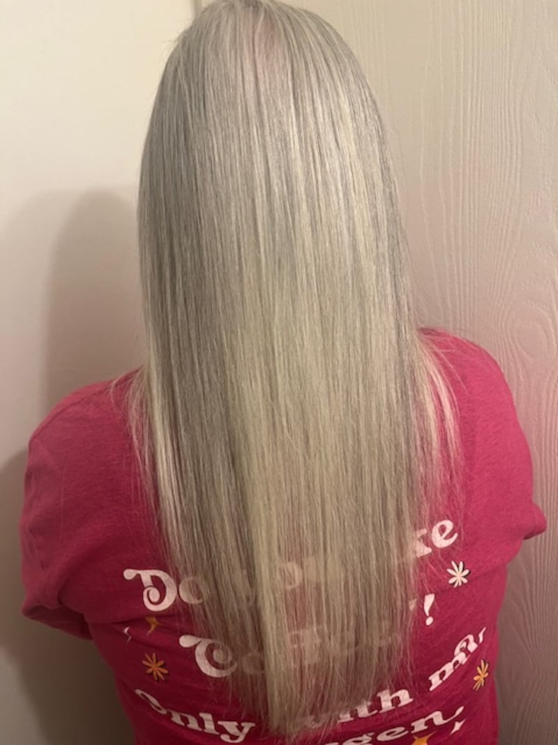 Amelia's gray hair from the back.