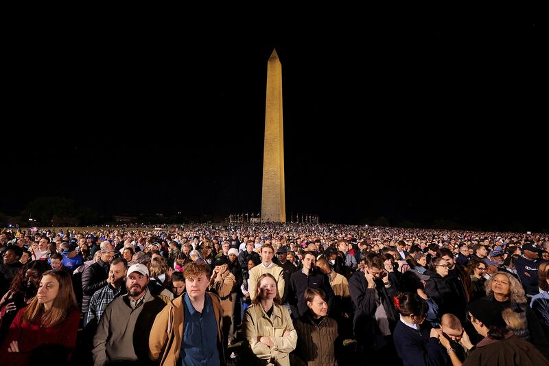 Supporter of Democratic presidential nominee Vice President Kamala Harris attend a rally on the National Mall one week before the Nov. 5 U.S. presidential election, in Washington, DC, Oct. 29, 2024.