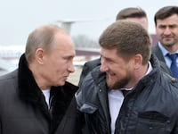 Russian Prime Minister Vladimir Putin laughing with Chechen leader Ramzan Kadyrov.