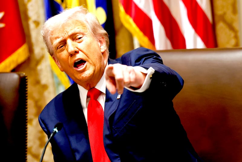 U.S. President Donald Trump gestures during a meeting with President of Argentina Javier Milei