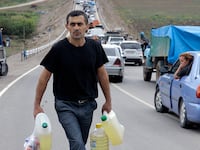 Armenians fleeing Nagorno-Karabakh in Lachin corridor.