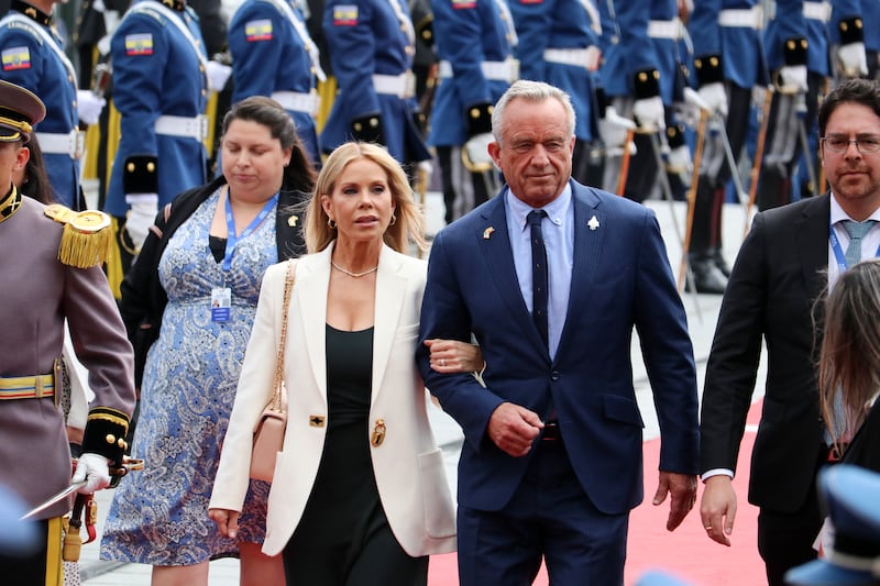 Health and Human Services Secretary Robert F. Kennedy Jr. (2nd R) and his wife, Cheryl Hines, arrive for the inauguration of Ecuador's re-elected President Daniel Noboa at the National Assembly in Quito on May 24, 2025.