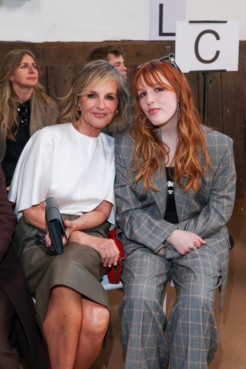 Helen Hunt with daughter Makena Lei Carnahan at the front row of Stella McCartney Spring 2026 ready-to-wear fashion show in Paris in March 2026.