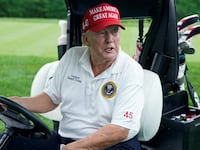Former US President and 2024 Presidential hopeful Donald Trump drives a golf cart during the Official Pro-Am Tournament ahead of the LIV Golf Invitational Series event at Trump National Golf Club Bedminster in Bedminster, New Jersey, on August 10, 2023. The LIV Golf Invitational Bedminster begins on August 11.