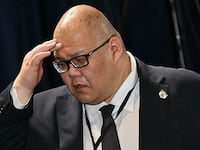 White House Communications Director Steven Cheung is seen during a US-Russia summit on Ukraine at Joint Base Elmendorf-Richardson in Anchorage, Alaska, on August 15, 2025. (Photo by Drew ANGERER / AFP) (Photo by DREW ANGERER/AFP via Getty Images)