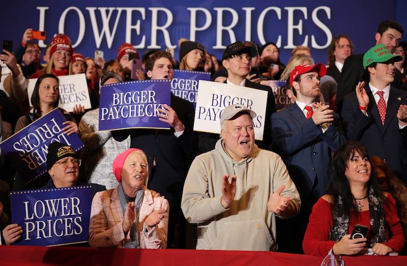 Supporters cheer as U.S. President Donald Trump delivers remarks during an event at Mount Airy Casino Resort