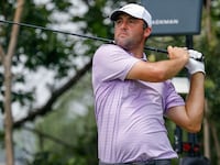 Scottie Scheffler hits his tee shot on the ninth hole during the third round of the Charles Schwab Challenge golf tournament on May 25, 2024 in Forth Worth, Texas.