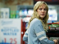 A photo including a still from the film The Stranger