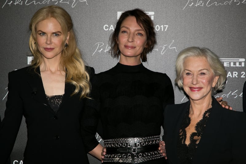 Nicole Kidman and Uma Thurman with Helen Mirren, in Paris, 2016.