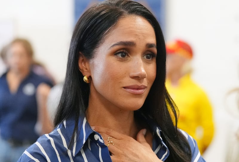 SYDNEY, AUSTRALIA - APRIL 17: Meghan, Duchess of Sussex meets volunteer first responders from Bondi Surf Bathers' Life Saving Club, during a visit to Bondi Beach, on day four of the royal trip to Australia on April 17, 2026 in Sydney, Australia. Volunteers from the organisation, founded in 1907, played an integral role in protecting beachgoers and saving lives during the terrorist attack at Bondi Beach on December 14. (Photo by Jonathan Brady-Pool/Getty Images)