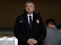 Dmitry Rybolovlev stands in a suite during a Champions League soccer match.