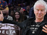 LOS ANGELES, CALIFORNIA - NOVEMBER 30: John McEnroe (L) attends a basketball game between the Los Angeles Lakers and the New Orleans Pelicans at Crypto.com Arena on November 30, 2025 in Los Angeles, California. NOTE TO USER: User expressly acknowledges and agrees that, by downloading and or using this photograph, User is consenting to the terms and conditions of the Getty Images License Agreement.