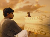 articles/2012/11/21/life-of-pi-comparing-ang-lee-s-film-with-yann-martel-s-novel/life-of-pi-munoz-tease_khhcix