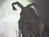 A photo still from 'John Carpenter's Suburban Screams'