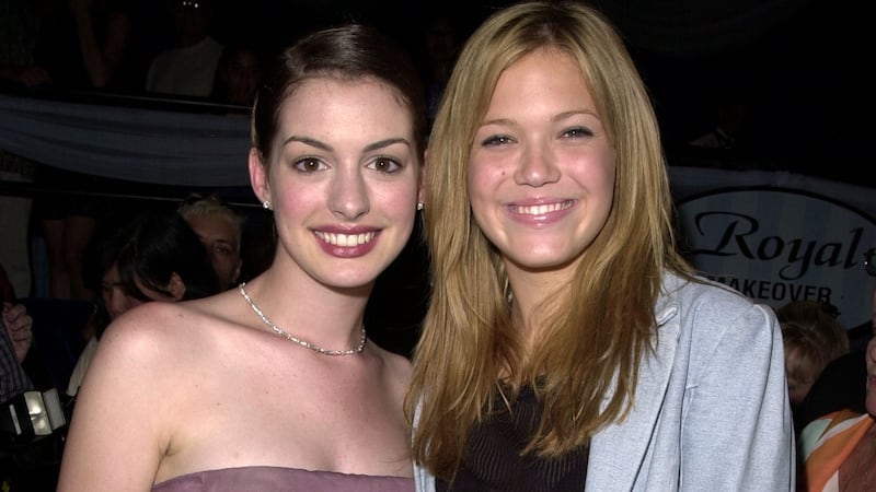 Anne Hathaway & Mandy Moore during The Princess Diaries Premiere After Party at El Capitan Theatre in Hollywood, California.