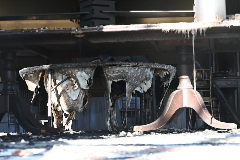 Melted tables at Pennsylvania Governor Josh Shapiro's residence following a suspected arson attack.