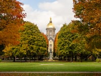 University of Notre Dame's Golden Dome, a historic landmark on campus at the main building.