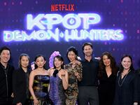 LOS ANGELES, CALIFORNIA - JUNE 16: (L-R) Dan Lin, Chairman of Film, Netflix, Maggie Kang, Ji-young Yoo, Arden Cho, May Hong, Chris Appelhans, Michelle Wong, Hannah Minghella, Head of Feature Animation, Netflix and Kristine Belson, President, Sony Pictures Animation, attend the KPop Demon Hunters Special Screening at Netflix Tudum Theater on June 16, 2025 in Los Angeles, California.