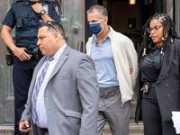 Jonathan Kaye is pictured in police custody leaving the NYPD 78th Precinct stationhouse in Brooklyn