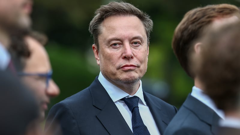 Elon Musk attends a press briefing with AI executives, held by Trump following a meeting on artificial intelligence, outside the White House on September 29, 2026.