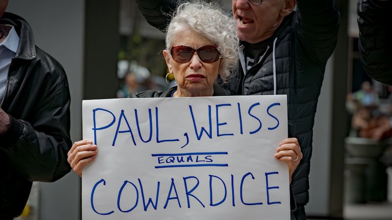 Earlier this year, protesters gathered outside New York-based law firms, including Paul Weiss, to oppose their capitulation to the Trump administration.