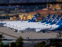 An Alaska Airlines flight turned back to Portland International Airport after passengers reported smelling fumes in the cabin.
