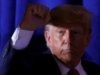 Former U.S. President and Republican presidential candidate Donald Trump gestures during a campaign event in Manchester, New Hampshire, U.S., April 27, 2023.