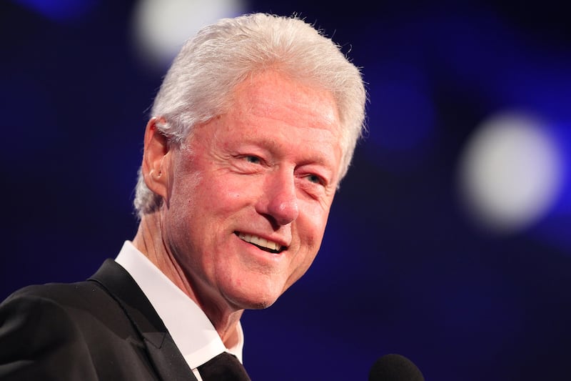 articles/2014/01/29/clinton-talks-cologne-and-world-inequality-at-fragrance-foundation-event/140129-binlot-clinton-tease_vzzxj7