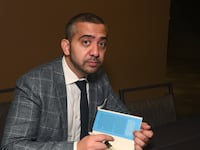 Mehdi Hasan as a book singing in California.