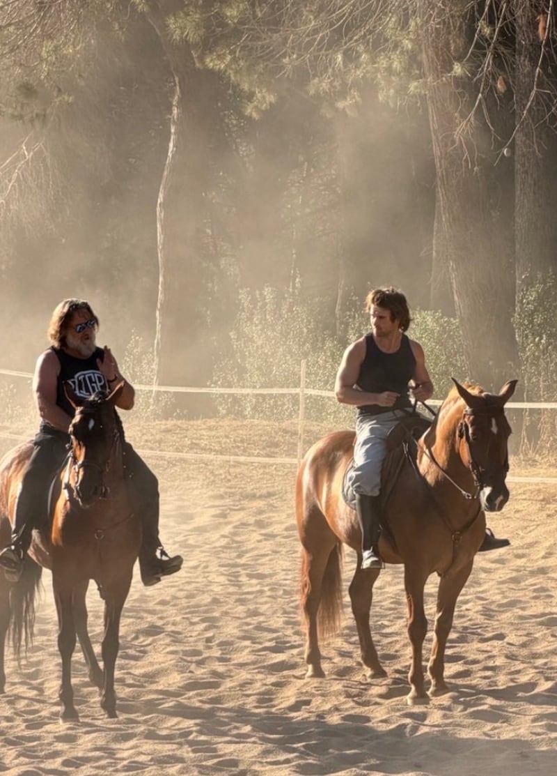 Russell Crowe shared a photo of himself and Tennyson riding horses.