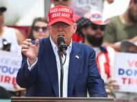 Former US President and Republican presidential candidate Donald Trump speaks during a campaign rally at Sunset Park in Las Vegas.