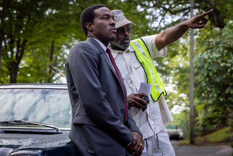 Yahya Abdul-Mateen II, left, and director Elegance Bratton on the set of "By Any Means."