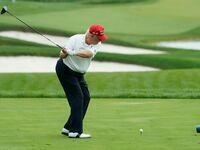 Former US President and 2024 Presidential hopeful Donald Trump plays golf during the Official Pro-Am Tournament ahead of the LIV Golf Invitational Series event at Trump National Golf Club Bedminster in Bedminster, New Jersey, on August 10, 2023. The LIV Golf Invitational Bedminster begins on August 11. (Photo by TIMOTHY A. CLARY / AFP) (Photo by TIMOTHY A. CLARY/AFP via Getty Images)