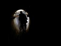 An image of an underground sewage tunnel in Paris.