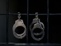 A generic photo of handcuffs.