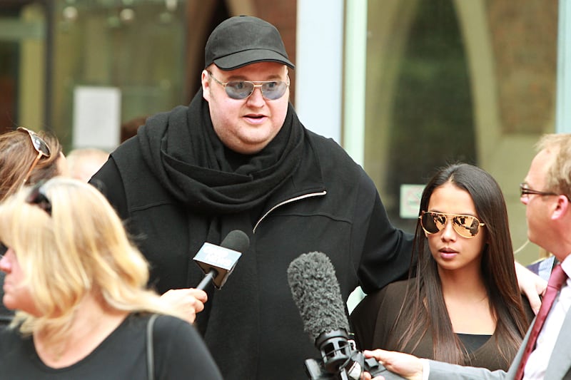 articles/2012/07/12/the-rise-and-fall-of-kim-dotcom-and-megaupload-10-burning-questions-answered/megaupload-singal-tease_pr4udj
