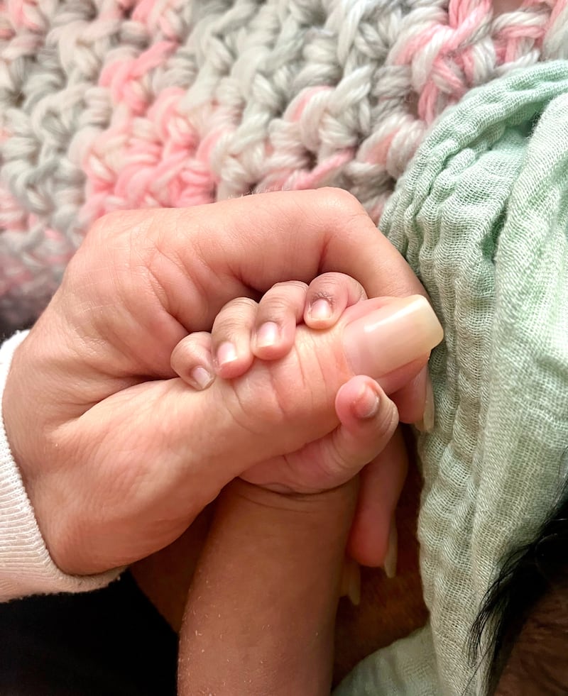 Tiffany Score gave birth to a healthy baby girl.