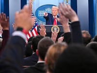 Donald Trump takes questions from the press.