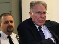 A photo of ex-NRA head Wayne LaPierre arriving in court.
