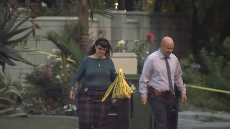 Investigators at the scene of the crime.