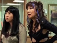 A photo including Awkwafina and Sandra Oh in Quiz Lady