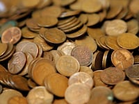 GLENVIEW, IL - JULY 06: Pennies are displayed at Glenview Coin & Collectibles July 6, 2006 in Glenview, Illinois. Reportedly due to manufacturing costs, the US Mint may be contemplating discontinuing the penny. (Photo by Tim Boyle/Getty Images)