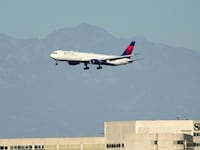 A Delta Air Lines Boeing 767 in the air.
