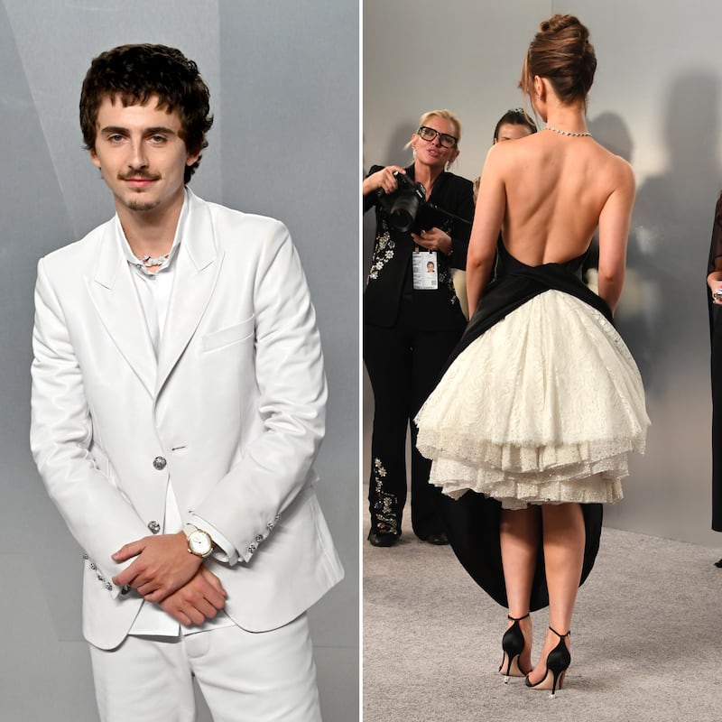 Timothee Chalamet (left) and Mia Goth pose for portraits on Vanity Fair's fuzzy slate floor.