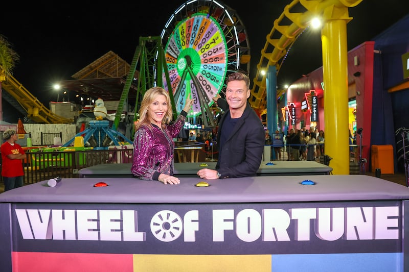 SANTA MONICA, CALIFORNIA - AUGUST 30: (L-R) Vanna White and Ryan Seacrest attend the WOF S42 – Pier Wheel Launch at Santa Monica Pier on August 30, 2024 in Santa Monica, California. (Photo by Phillip Faraone/Getty Images for CBS Media Ventures / Sony Pictures Television)