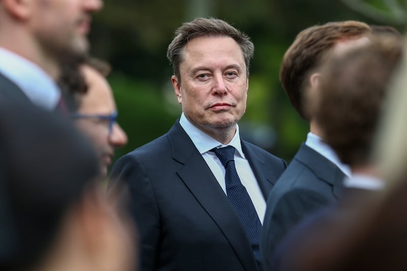Elon Musk attends a press briefing with AI executives, held by Trump following a meeting on artificial intelligence, outside the White House on September 29, 2026.
