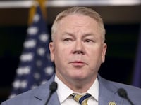 U.S. Rep. Warren Davidson (R-OH) speaks alongside fellow Freedom Caucus members during a press conference on the government funding bill at the U.S. Capitol on March 22, 2024 in Washington, DC.