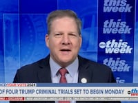 New Hampshire Gov. Chris Sununu sitting for an interview.